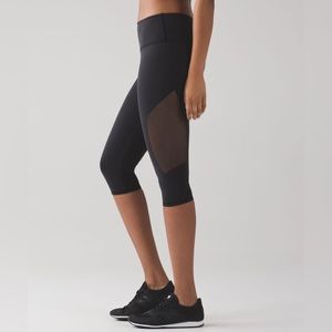 Lululemon Reveal Crop in Black. 
Size 2. 
Pristine Condition.
